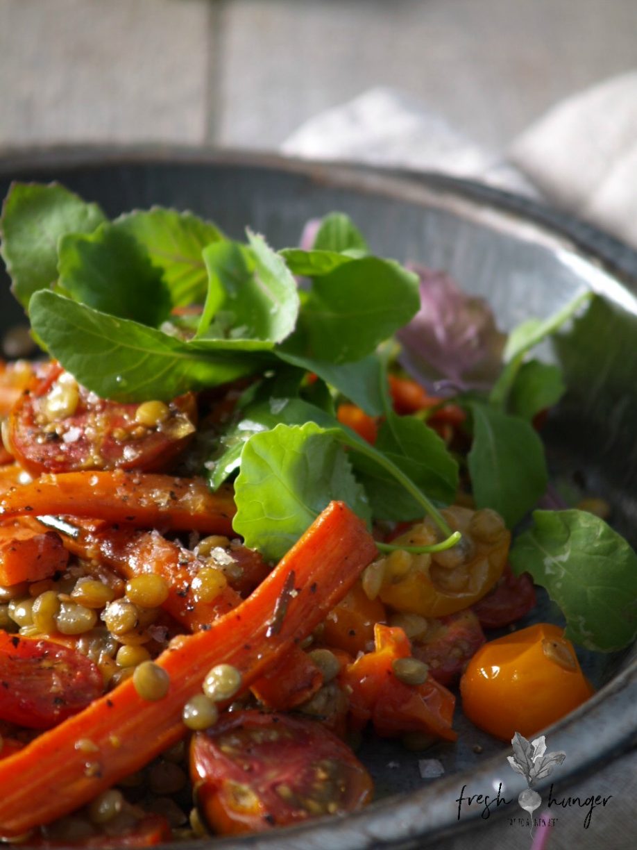 Warm roasted carrot, tomato & lentil salad is one of the many super simple recipes I make that I hesitate to share because of its simplicity & rusticness. Simple, wholesome foods